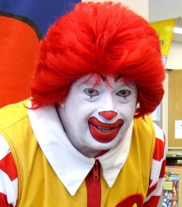 You know how much I hate clowns. Just looking at this freak is disturbing me immensely.  His hair is tamer than mine though. 