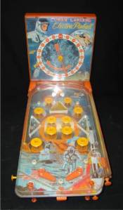 I don't think my mini pinball game had astronauts on it--but it was orange.  